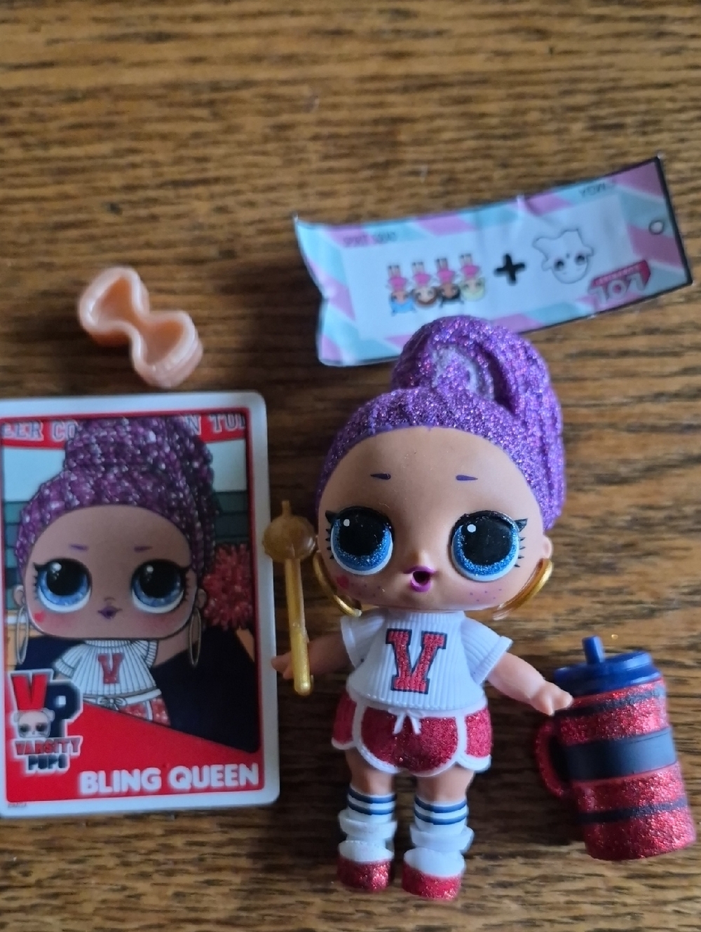 L.O.L. Surprise! Bling Queen Doll - Purple Hair, Red & White Outfit